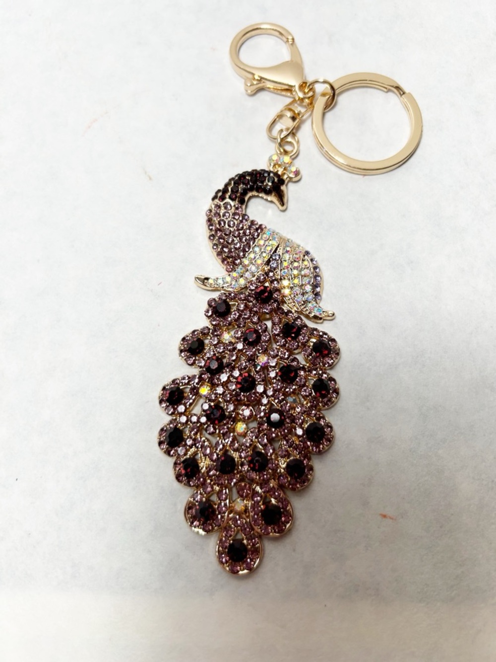 Gold-Tone Peacock Keychain Bag Charm with Purple and Red Rhinestones